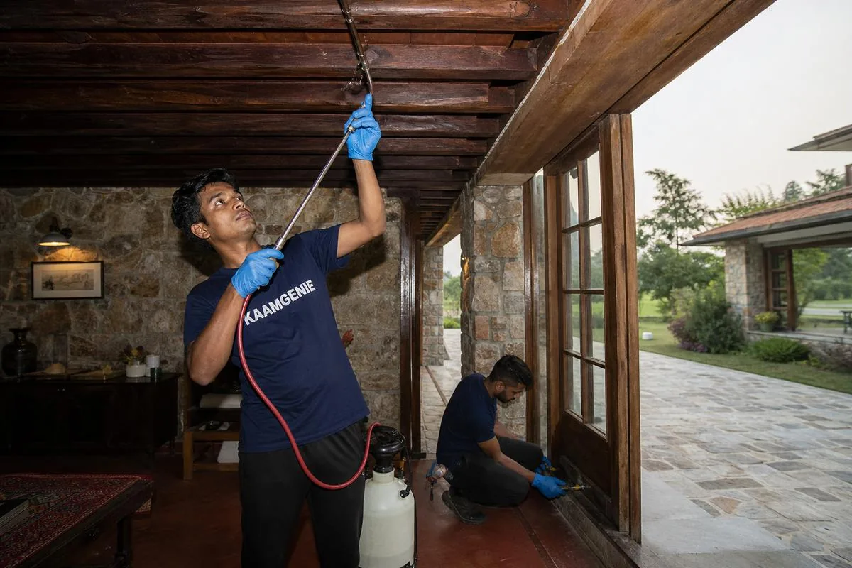 KaamGenie pest control technician treating a Tigaon property in Faridabad