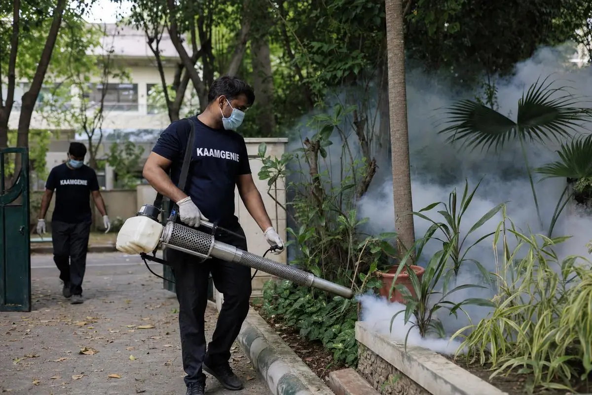KaamGenie pest control technician treating a Geetanjali Enclave property in South Delhi