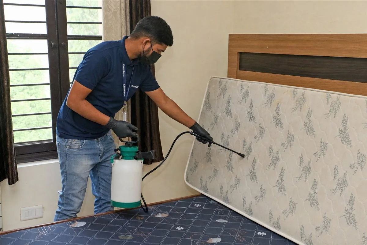 KaamGenie pest control technician treating a Hastsal property in West Delhi