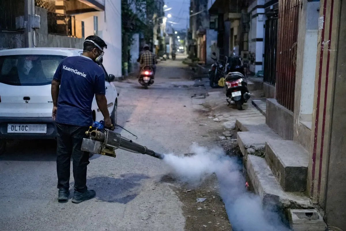 KaamGenie pest control technician treating a IP Extension property in East Delhi