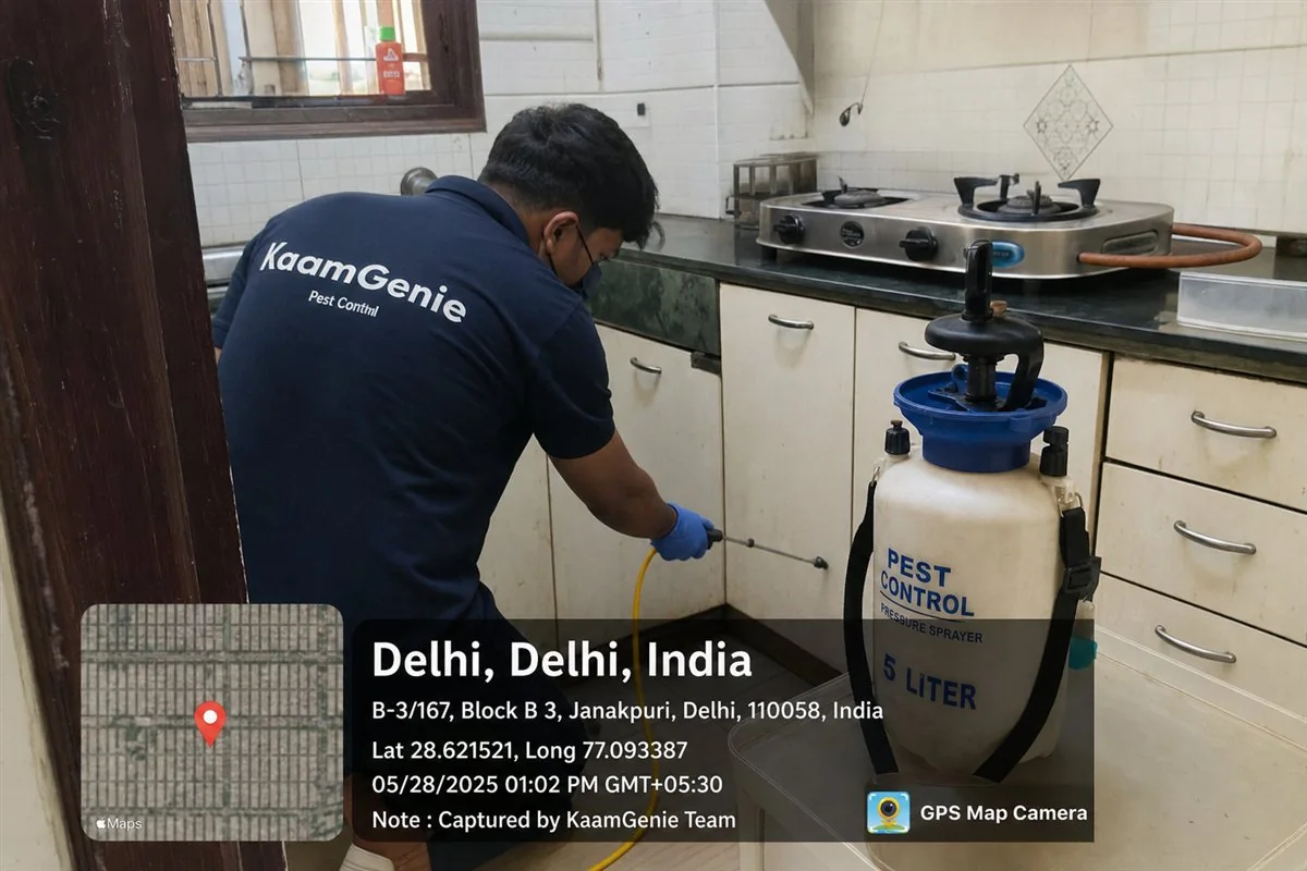 KaamGenie pest control technician treating a Janakpuri B Block property in West Delhi