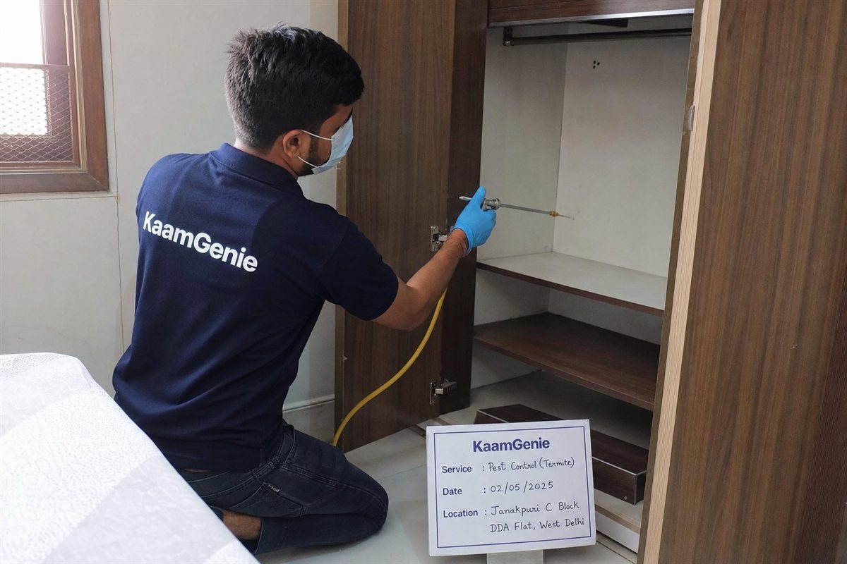 KaamGenie pest control technician treating a Janakpuri C Block property in West Delhi