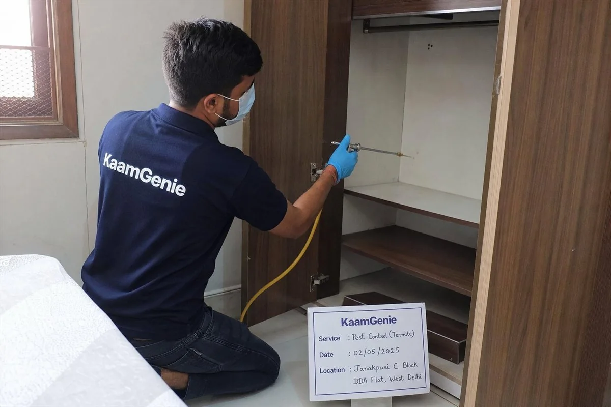 KaamGenie pest control technician treating a Janakpuri C Block property in West Delhi