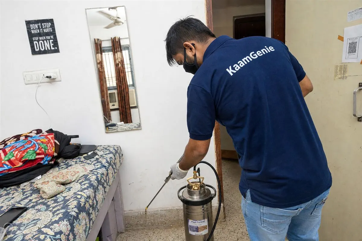 KaamGenie pest control technician treating a Jawahar Nagar property in North Delhi / Central Delhi