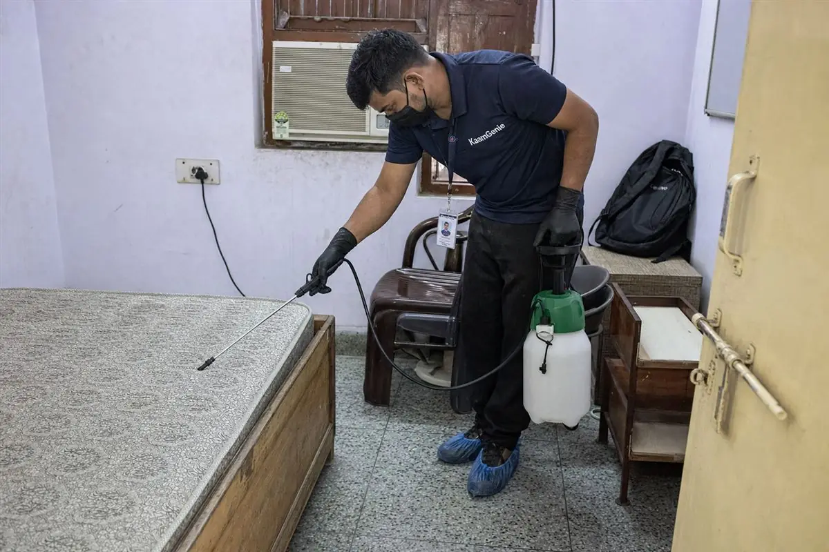 KaamGenie pest control technician treating a Kapashera property in South-West Delhi