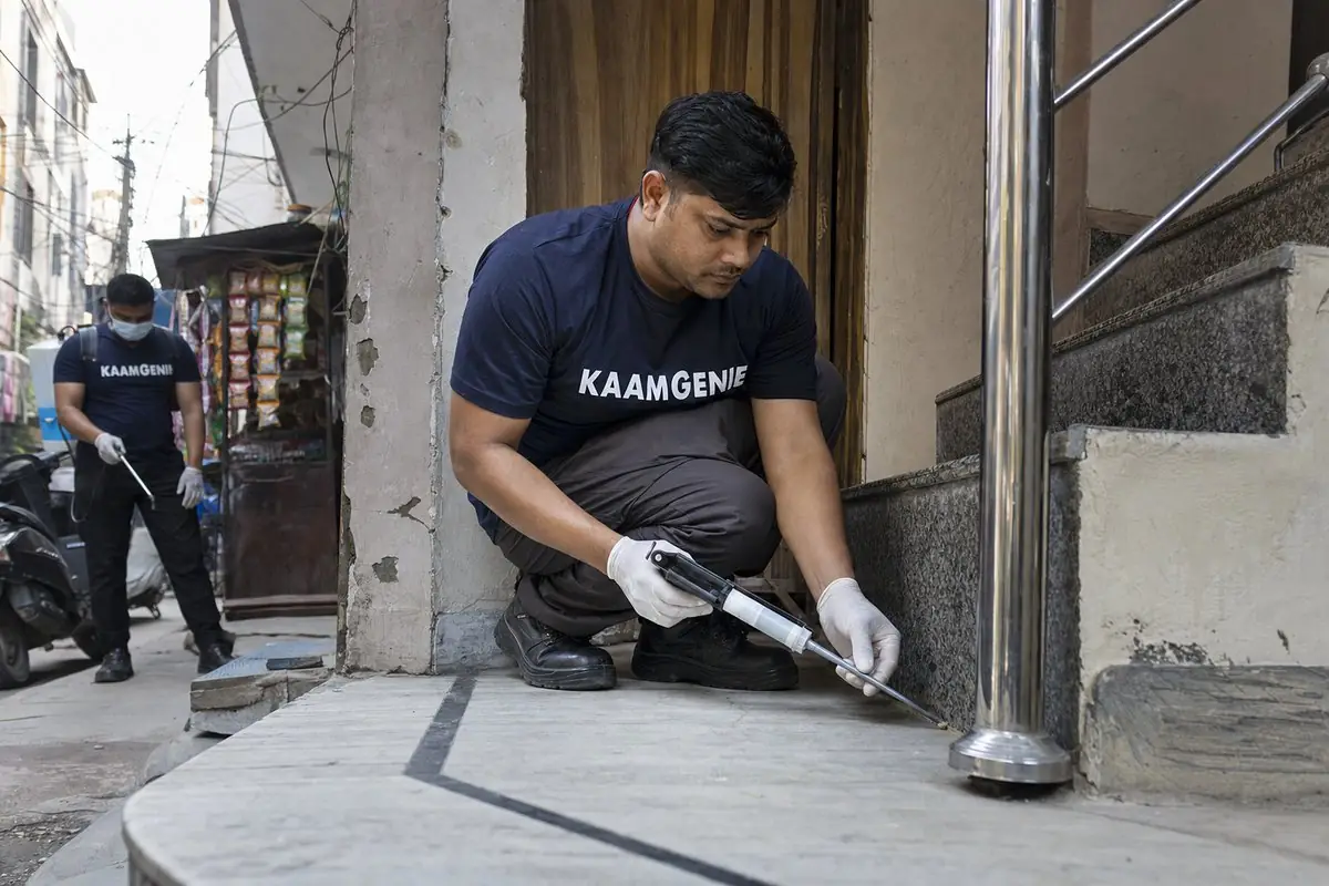 KaamGenie pest control technician treating a Kardampuri property in East Delhi