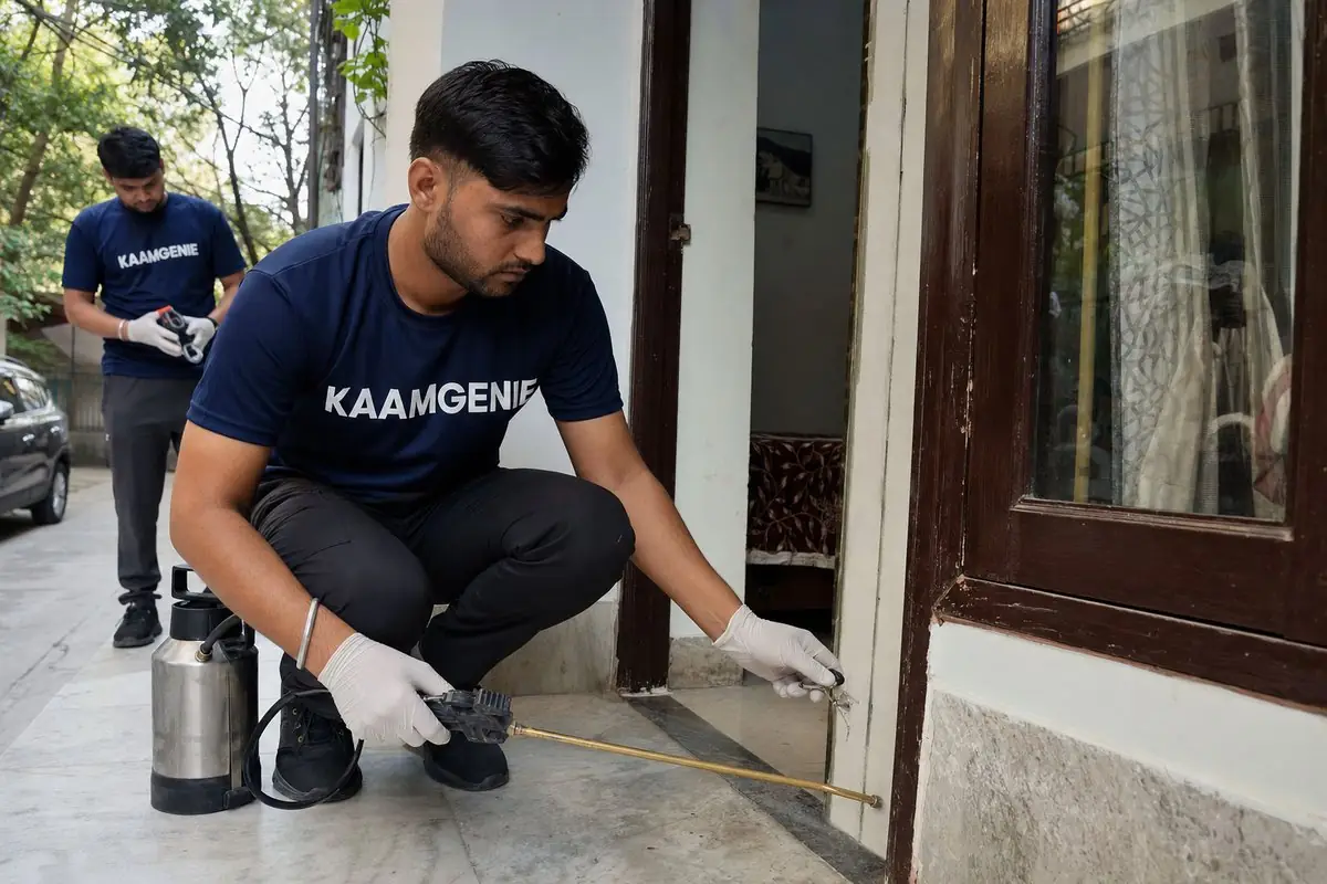 KaamGenie pest control technician treating a Krishna Nagar (Safdarjung) property in South Delhi