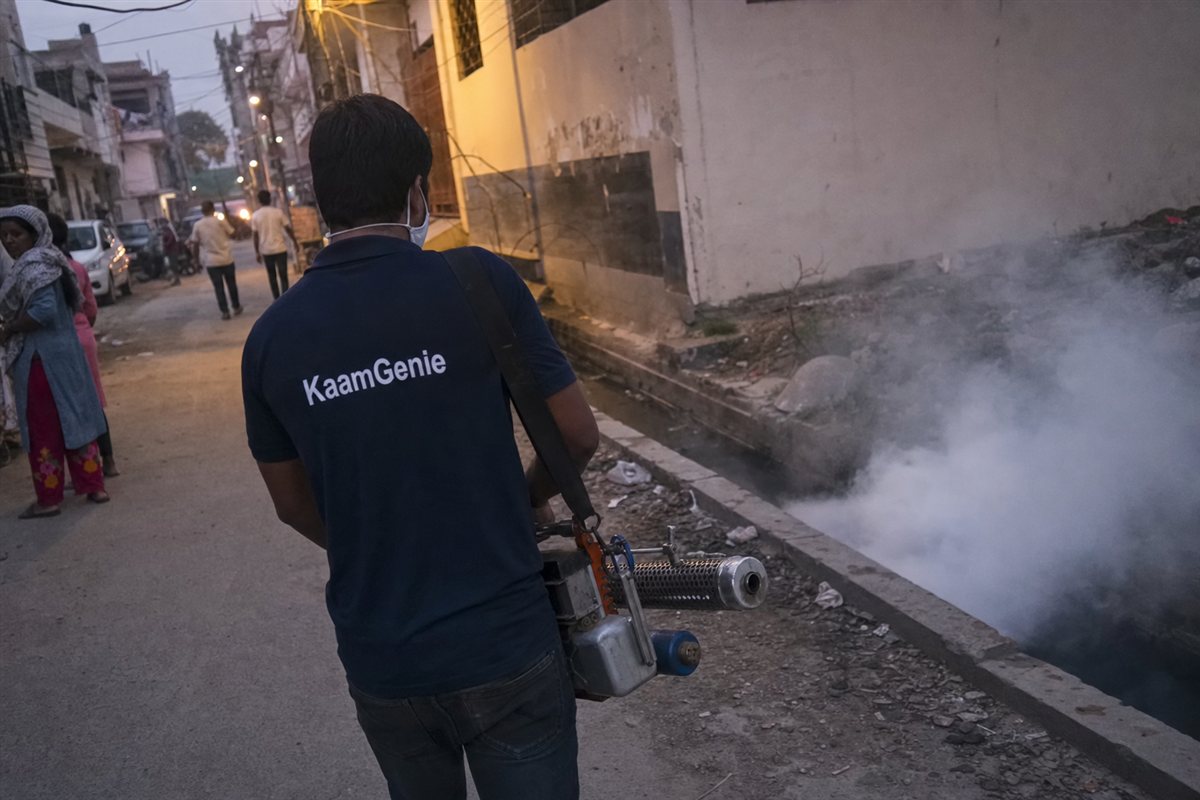 KaamGenie pest control technician treating a Laxmi Nagar East property in East Delhi