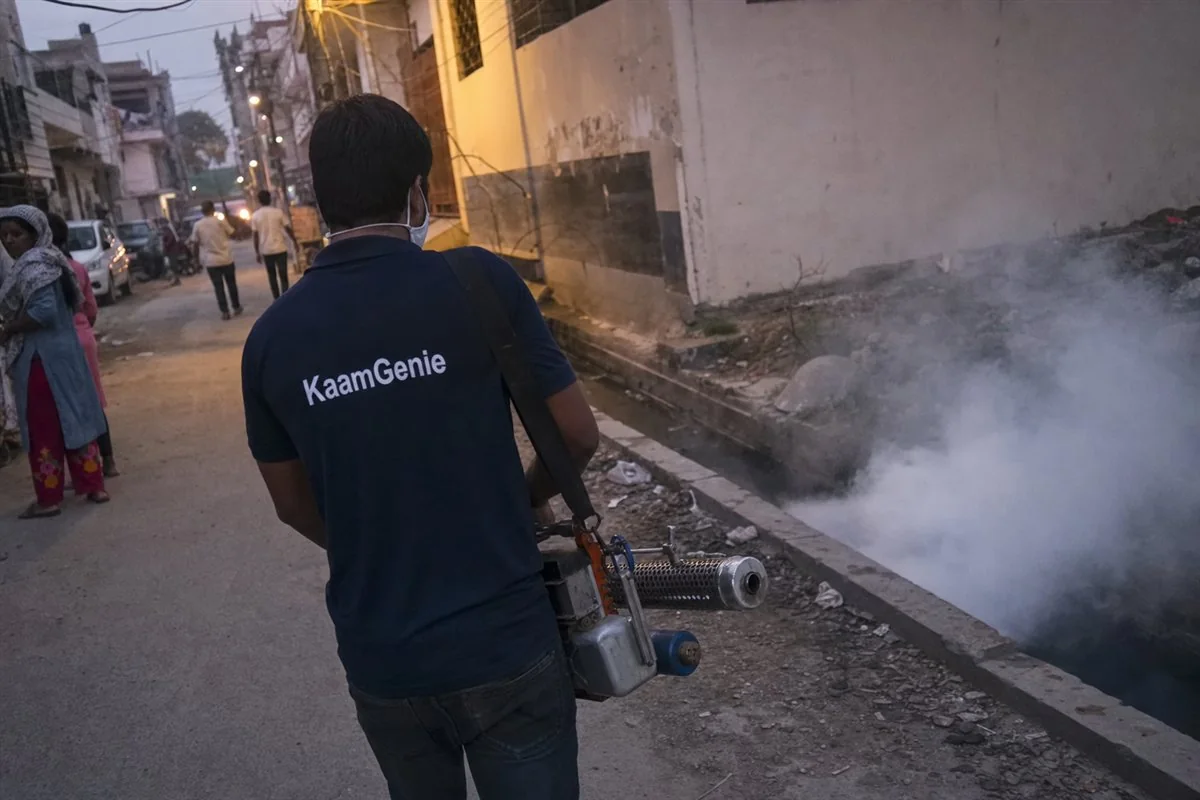 KaamGenie pest control technician treating a Laxmi Nagar East property in East Delhi