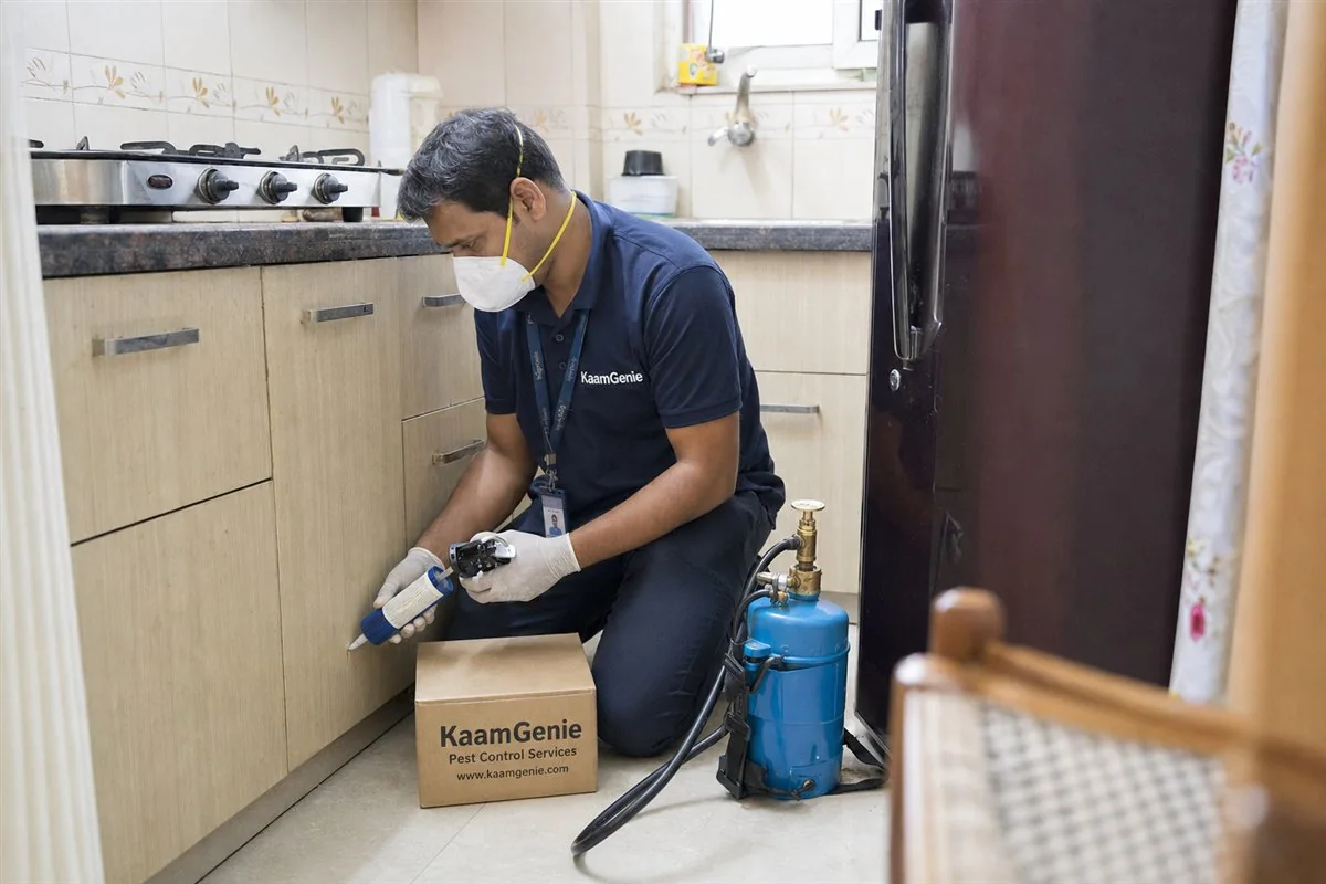 KaamGenie pest control technician treating a Matiala property in West Delhi