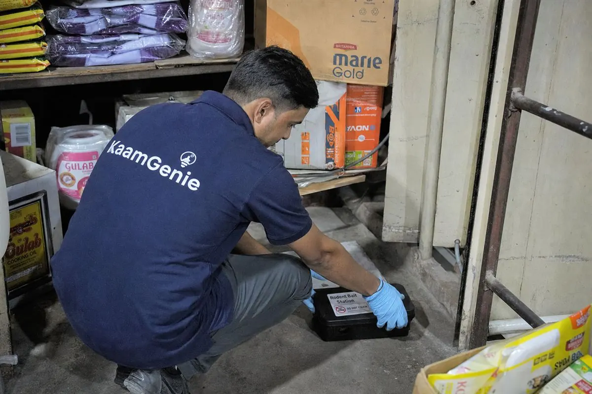 KaamGenie pest control technician treating a Mayur Vihar property in East Delhi