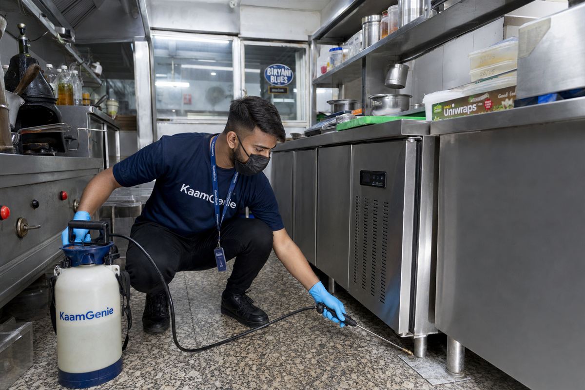 KaamGenie pest control technician treating a Mayur Vihar Phase 2 property in East Delhi