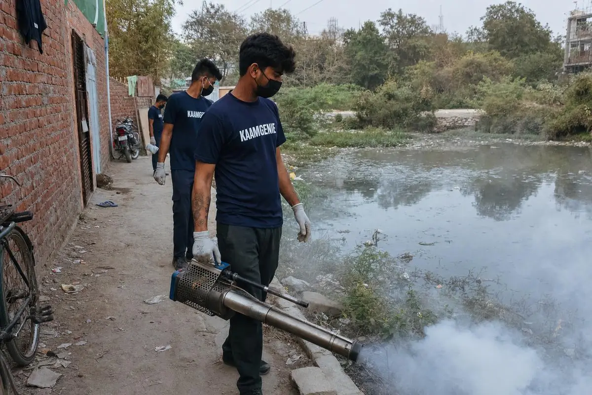 KaamGenie pest control technician treating a Mujeeb Bagh property in South Delhi