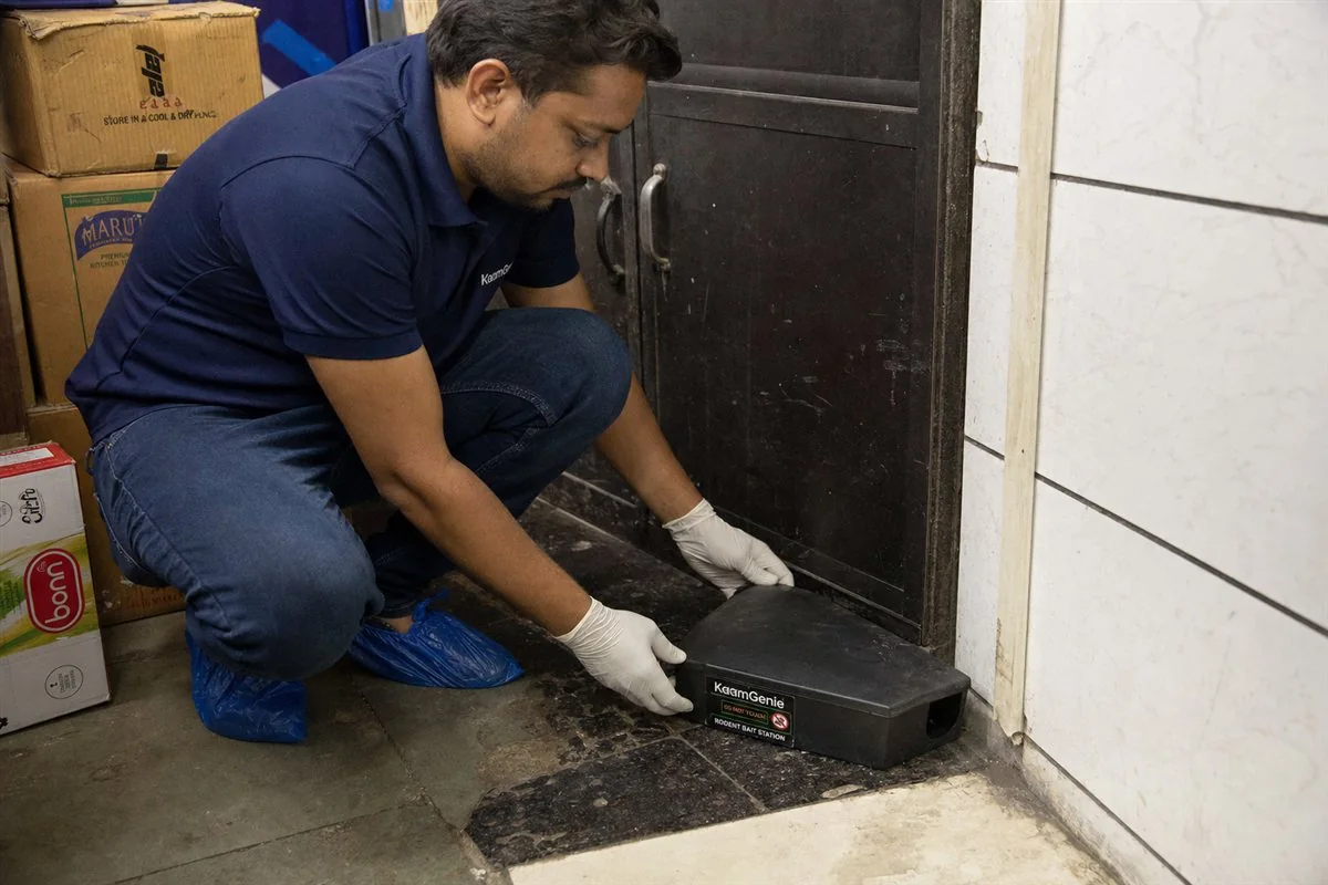 KaamGenie pest control technician treating a Paharganj property in North & Central Delhi