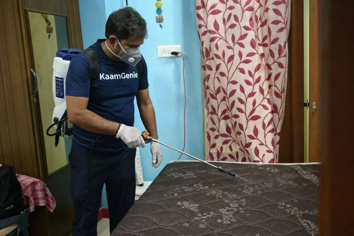 KaamGenie pest control technician treating a Pandav Nagar property in East Delhi