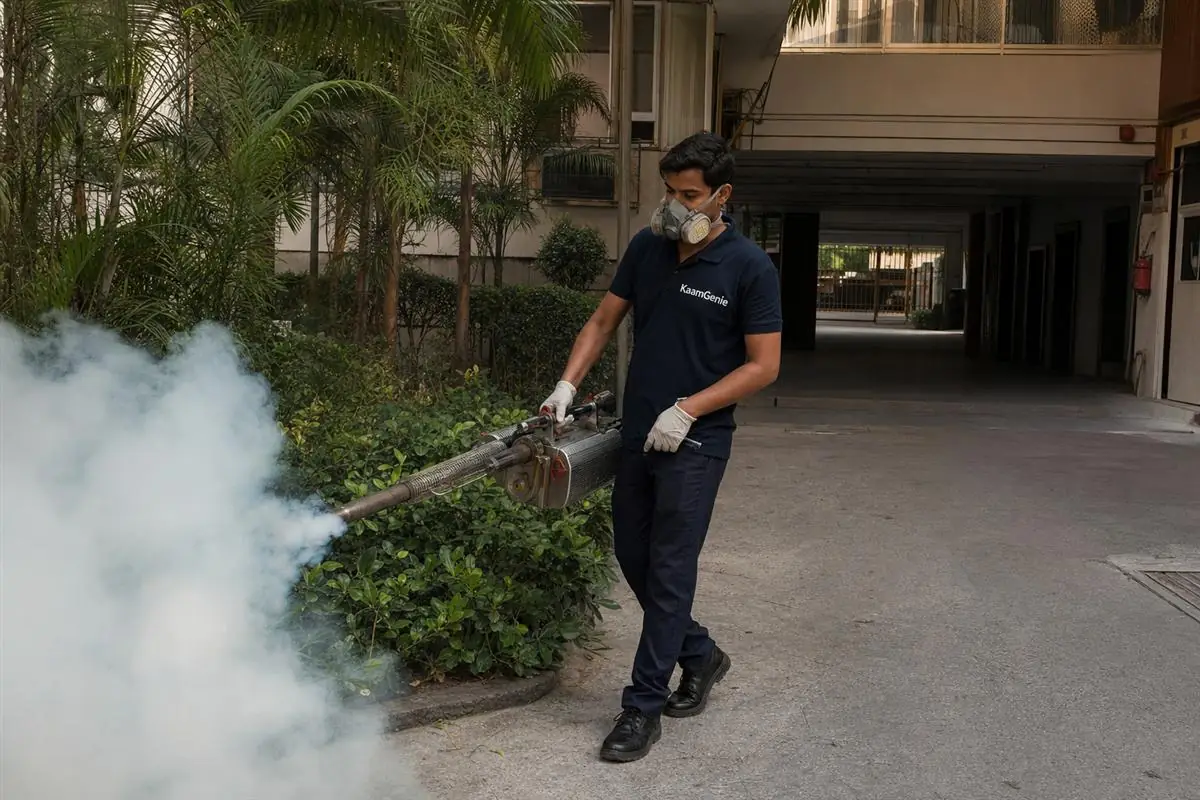 KaamGenie pest control technician treating a Paschim Vihar property in West Delhi