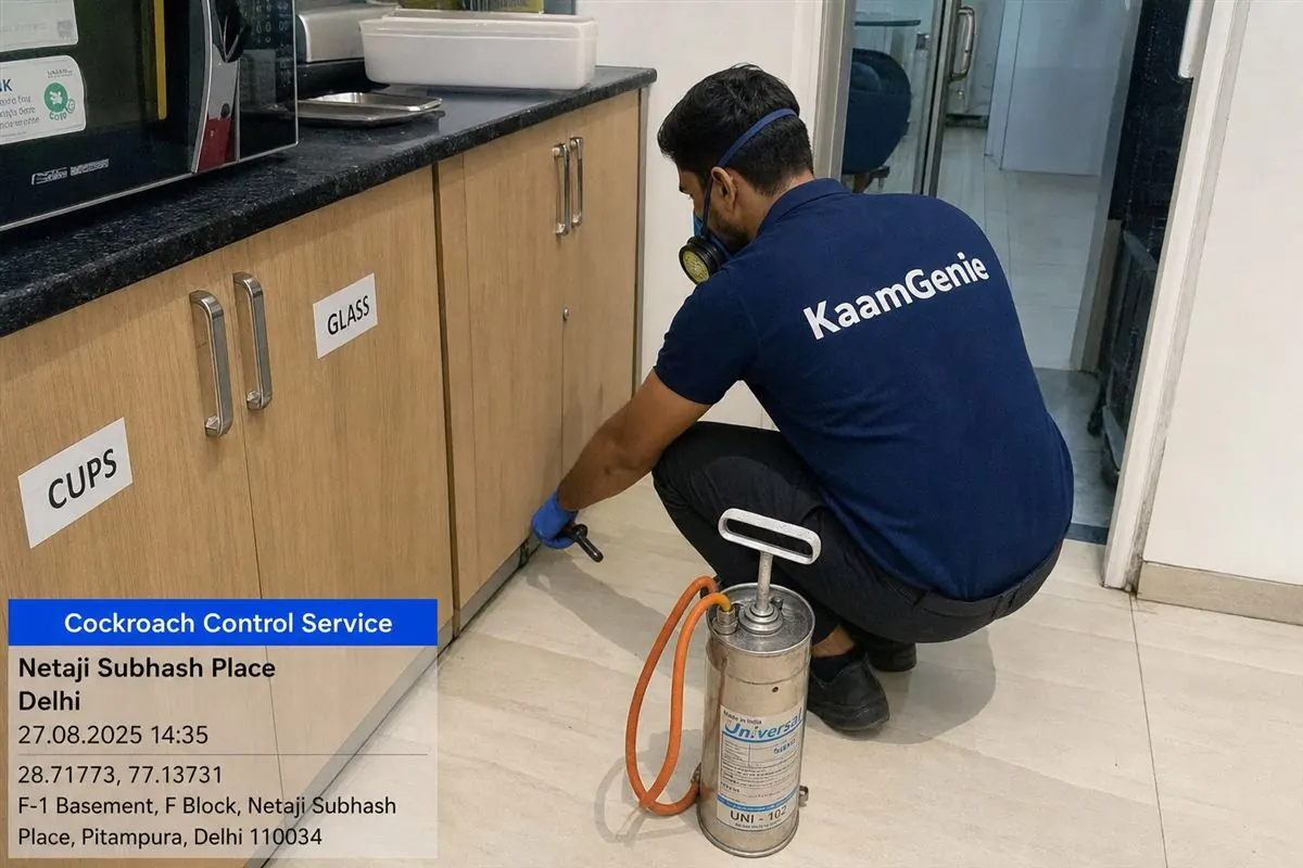 KaamGenie pest control technician treating a Pitampura property in North-West Delhi