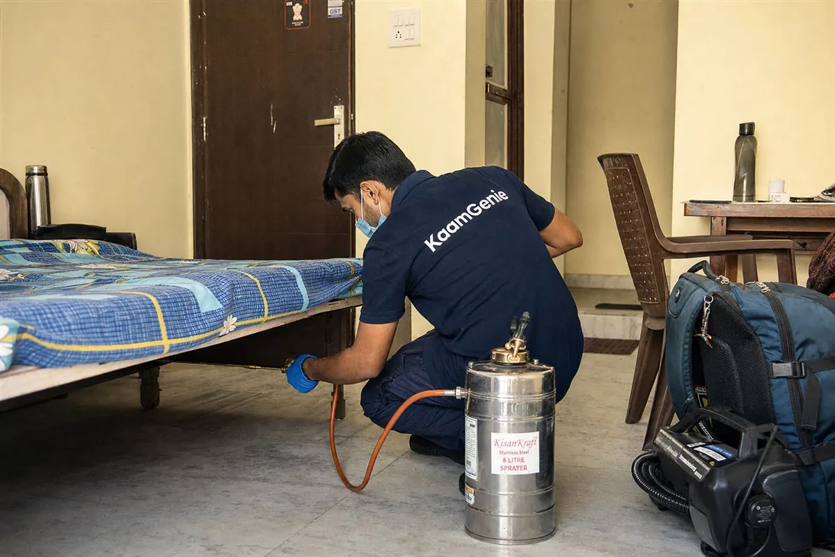 KaamGenie pest control technician treating a Rajinder Nagar property in North Delhi / Central Delhi