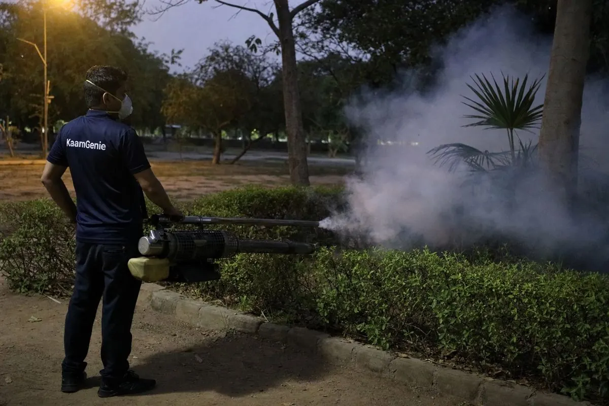 KaamGenie pest control technician treating a Rohini Sector 11 property in North-West Delhi