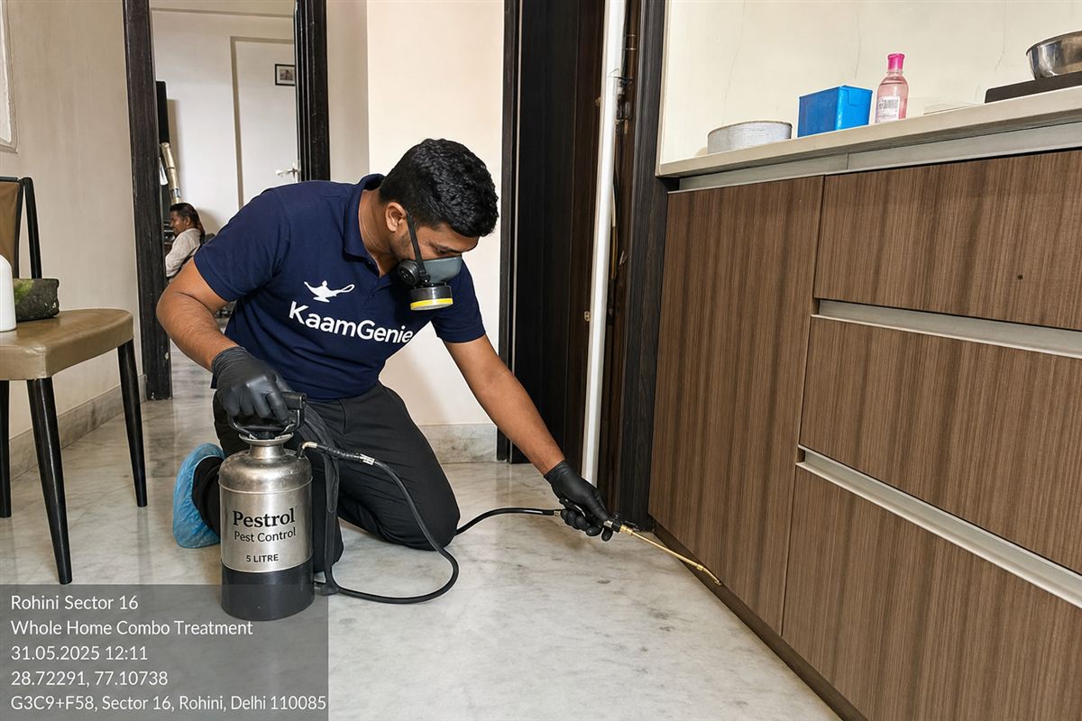 KaamGenie pest control technician treating a Rohini Sector 16 property in North-West Delhi