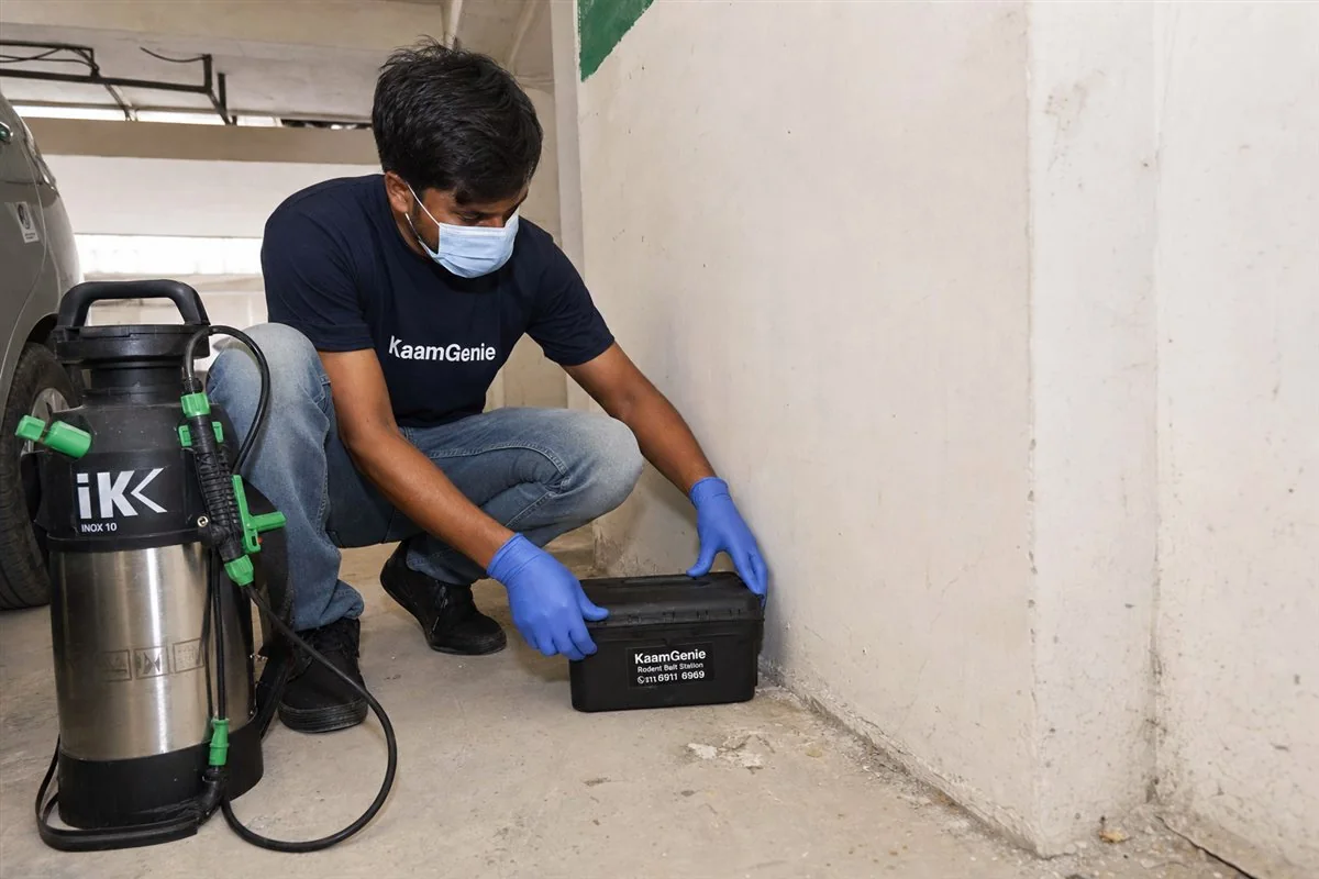KaamGenie pest control technician treating a Rohini Sector 24 property in North-West Delhi