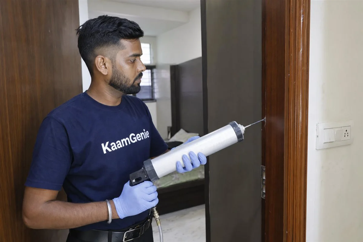 KaamGenie pest control technician treating a Rohini Sector 29 property in North-West Delhi
