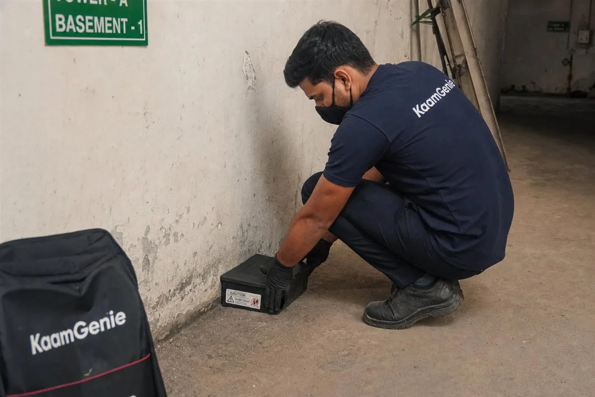 KaamGenie pest control technician treating a Rohini Sector 30 property in North-West Delhi