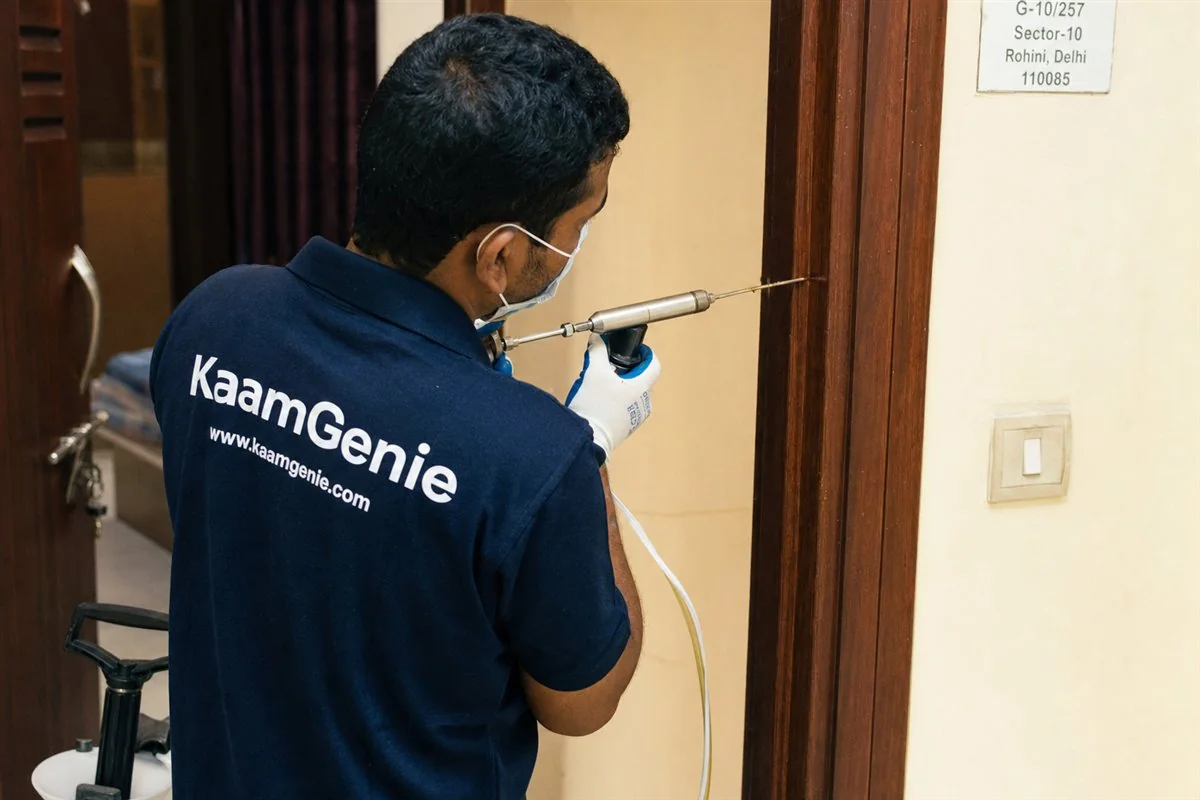 KaamGenie pest control technician treating a Rohini Sector 35 property in North-West Delhi
