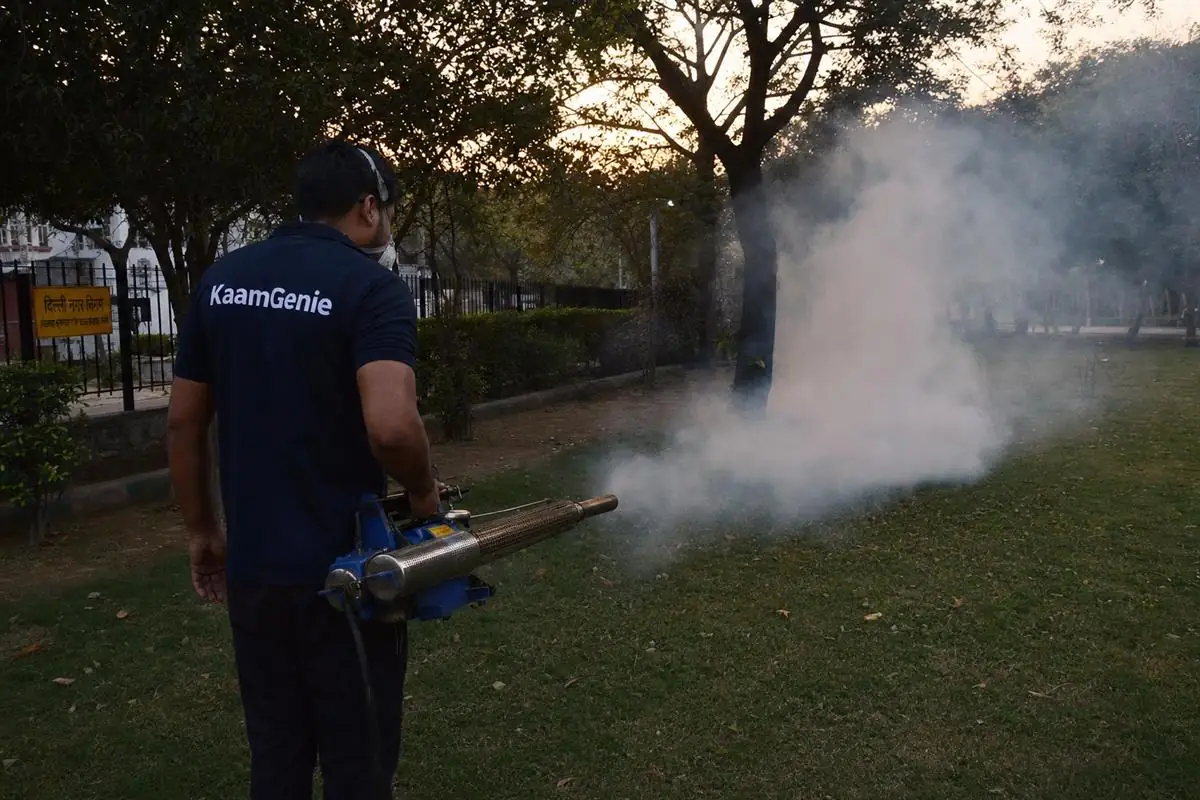 KaamGenie pest control technician treating a Rohini Sector 4 property in North-West Delhi