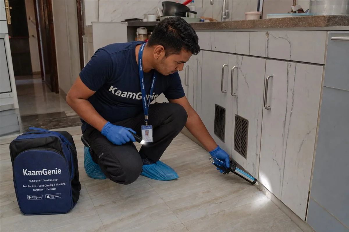 KaamGenie pest control technician treating a Rohini Sector 6 property in North-West Delhi