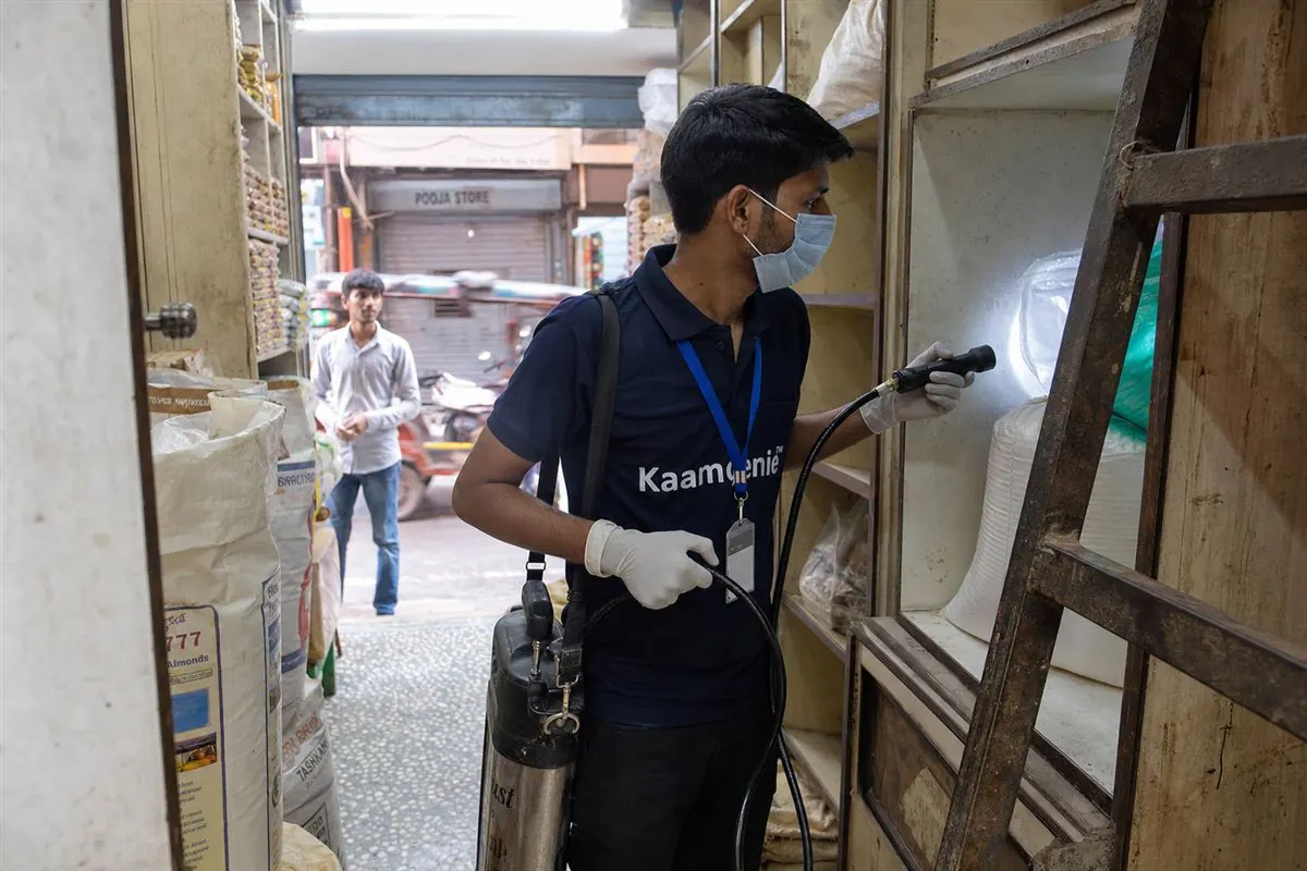 KaamGenie pest control technician treating a Sadar Bazar property in North Delhi / Central Delhi