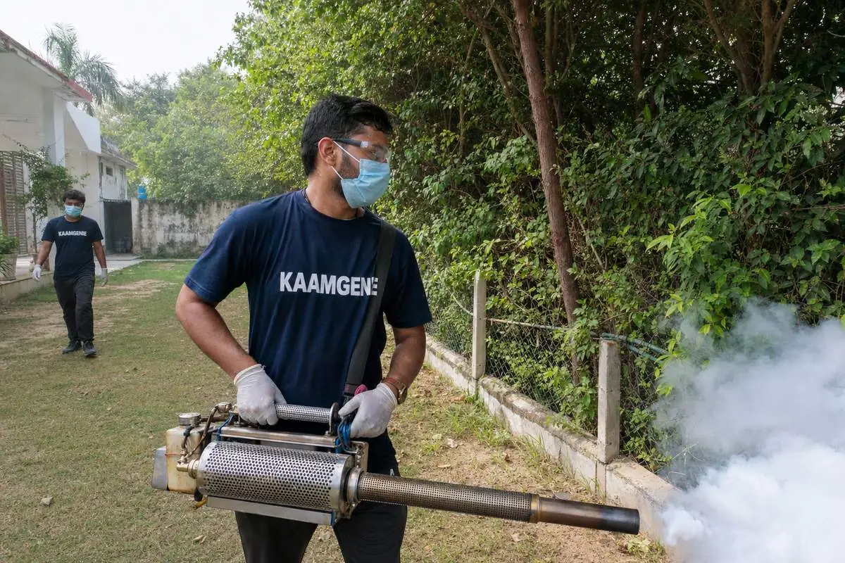 KaamGenie pest control technician treating a Satbari property in South Delhi