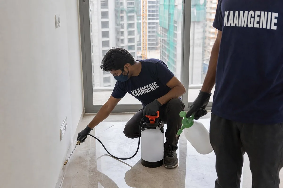 KaamGenie pest control technician treating a Sector 104 property in Gurgaon
