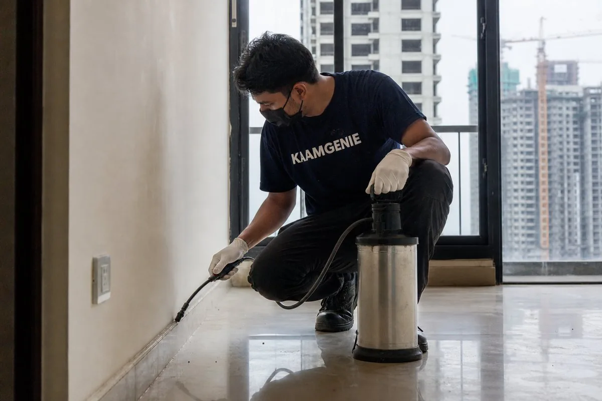KaamGenie pest control technician treating a Sector 137 property in Noida