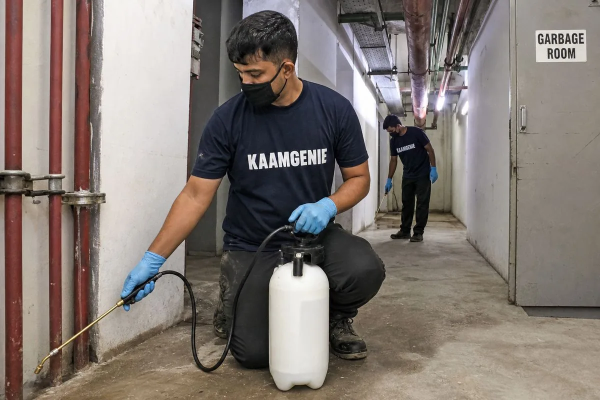 KaamGenie pest control technician treating a Sector 44 property in Noida