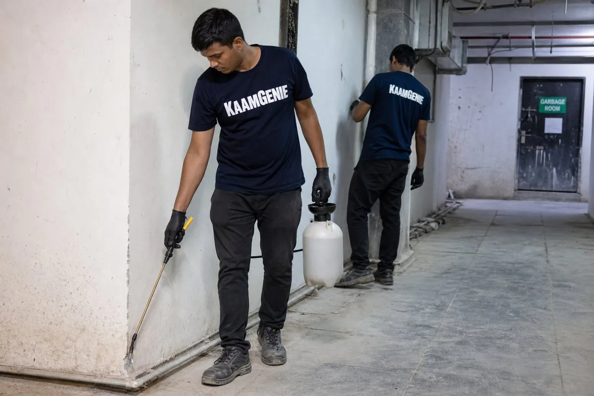 KaamGenie pest control technician treating a Sector 70 property in Noida