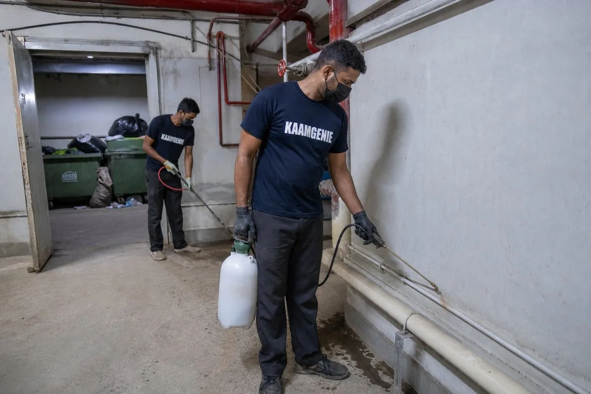 KaamGenie pest control technician treating a Sector 71 property in Noida