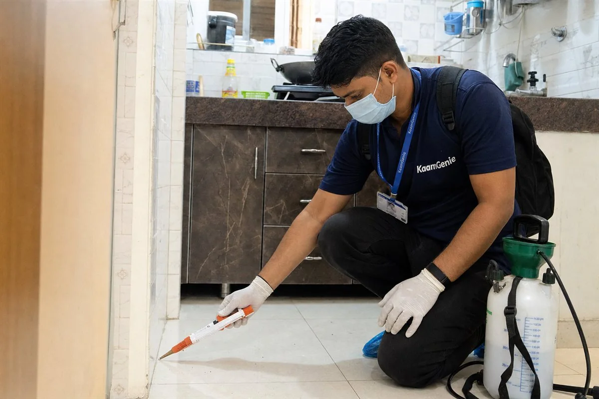 KaamGenie pest control technician treating a Seelampur property in East Delhi