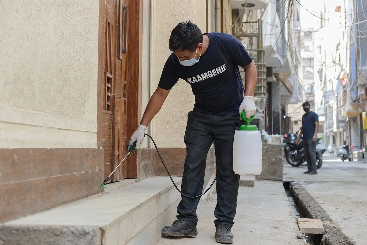 KaamGenie pest control technician treating a Shiv Vihar property in East Delhi