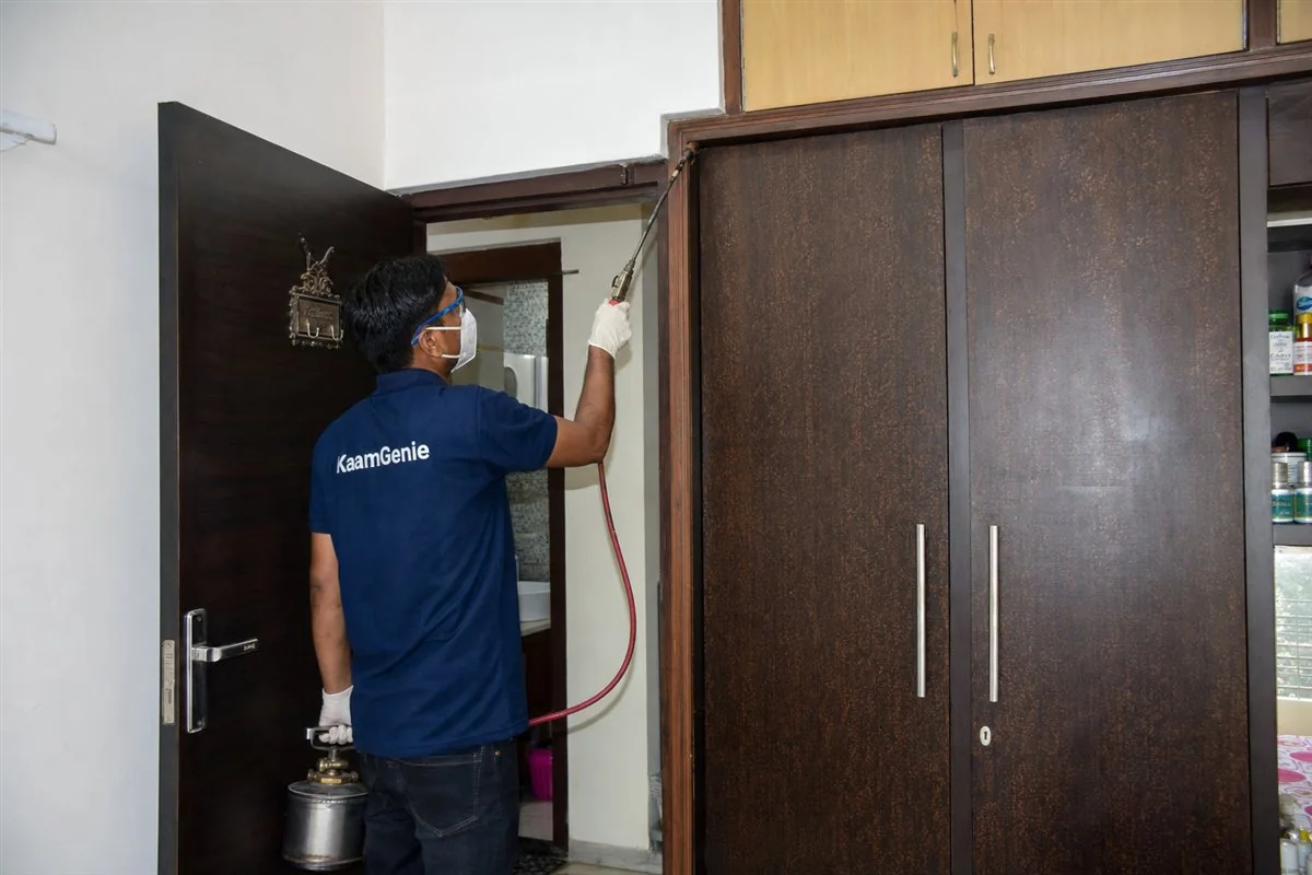 KaamGenie pest control technician treating a Shivaji Park property in West Delhi