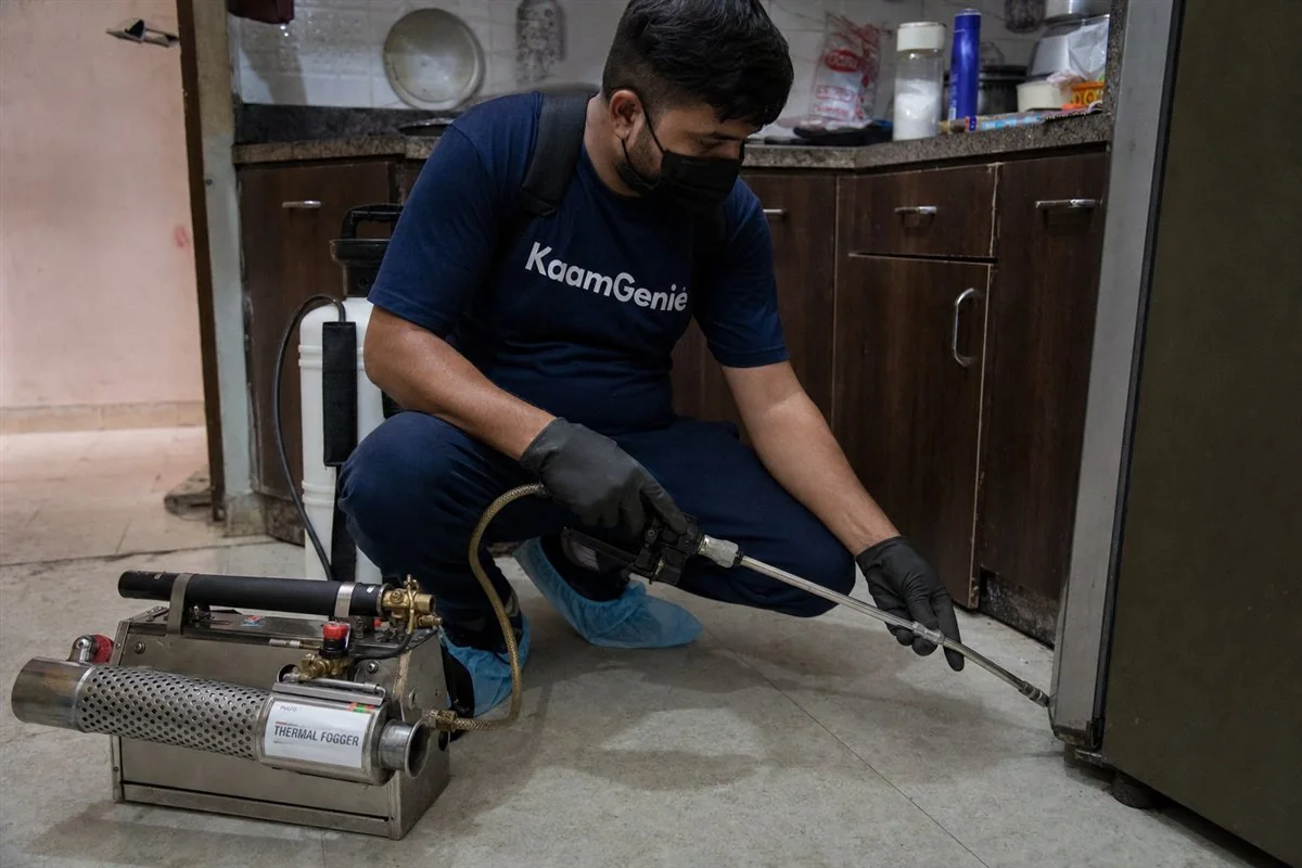 KaamGenie pest control technician treating a Sultanpuri property in North-West Delhi