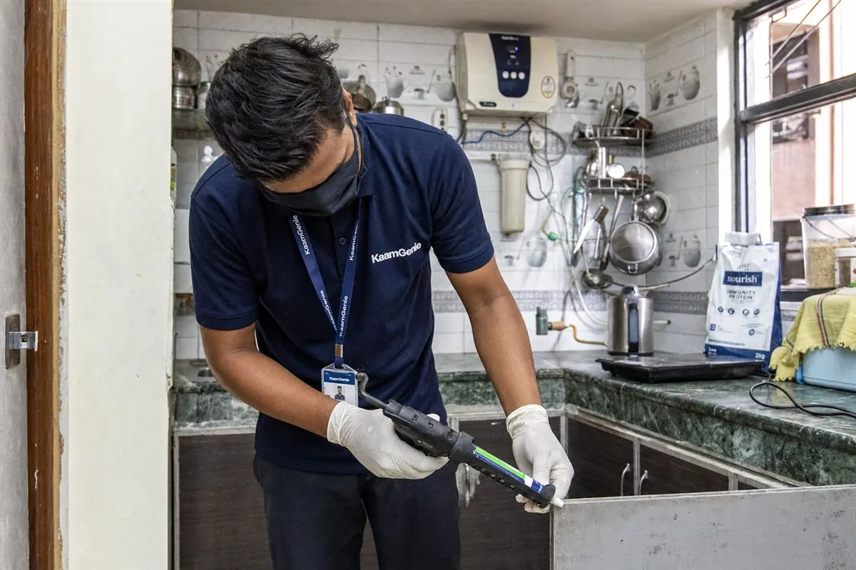 KaamGenie pest control technician treating a Tagore Garden property in West Delhi