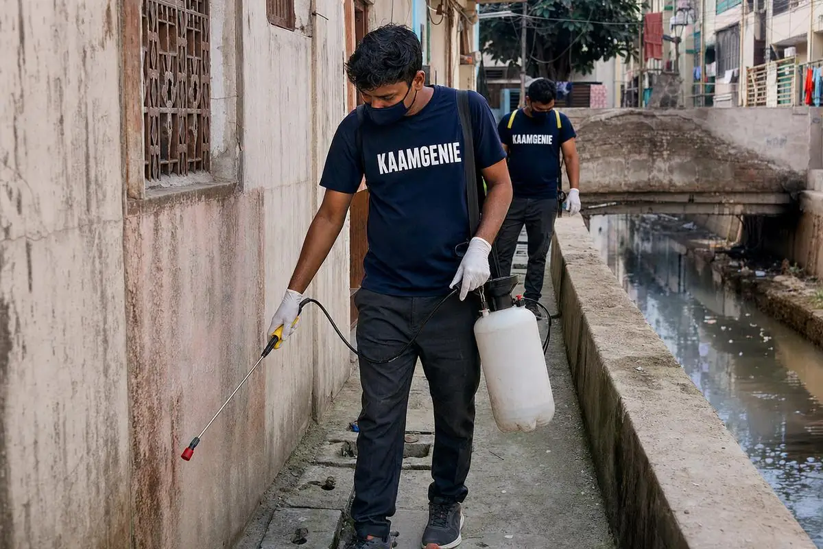 KaamGenie pest control technician treating a Taimoor Nagar property in South Delhi