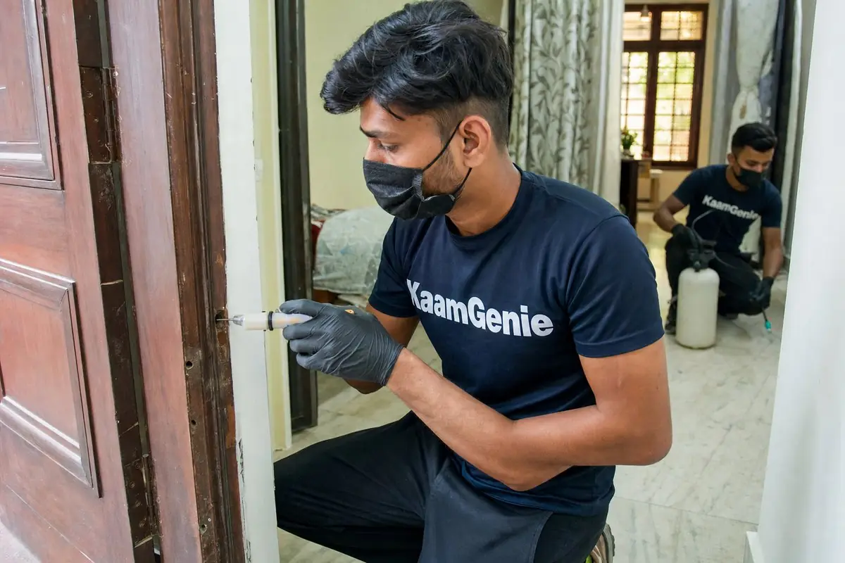 KaamGenie pest control technician treating a Vinod Nagar property in East Delhi