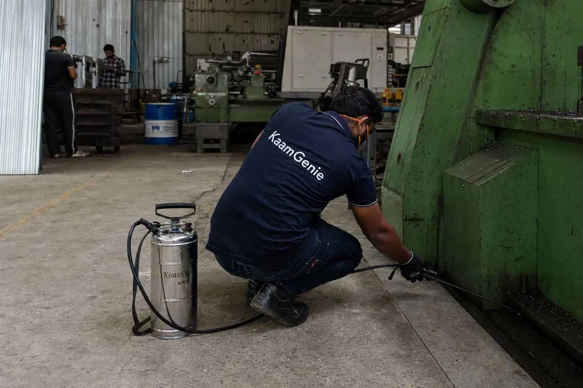 KaamGenie pest control technician treating a Wazirpur property in North-West Delhi