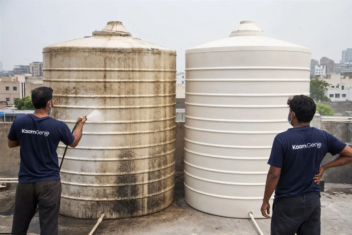 Before and after comparison of a Gurgaon PG water tank - a dirty sediment-lined tank beside a clean disinfected one