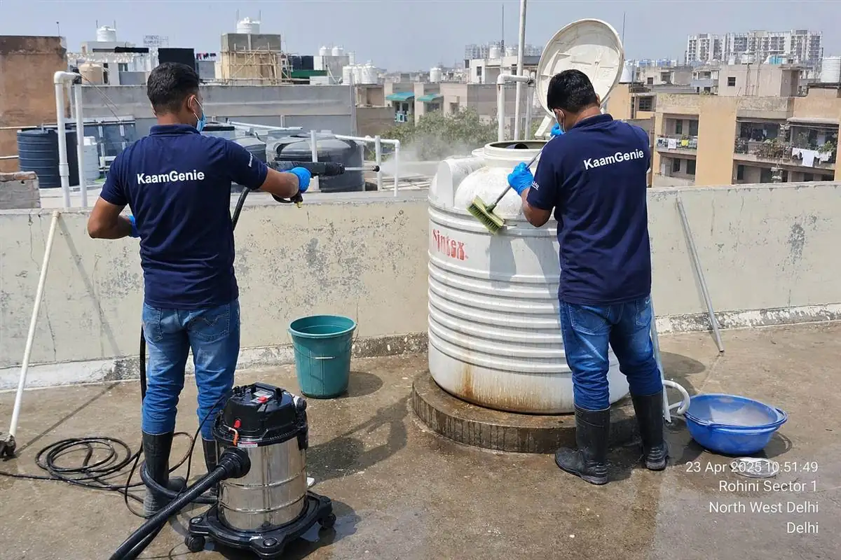KaamGenie crew cleaning a water tank in Rohini Sector 1, Delhi