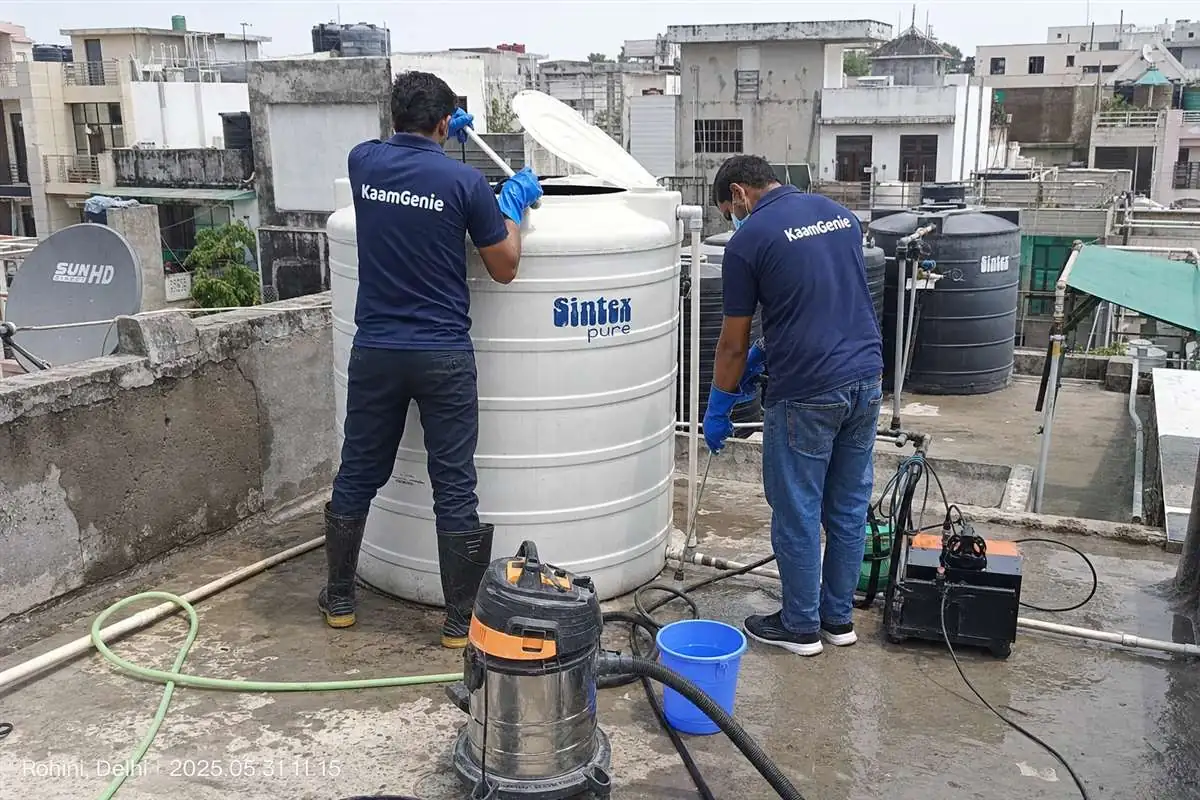 KaamGenie crew cleaning a water tank in Rohini Sector 13, Delhi