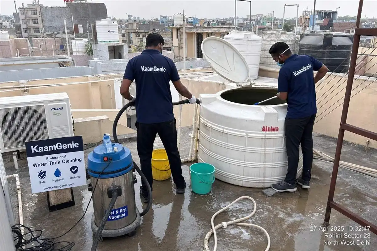 KaamGenie crew cleaning a water tank in Rohini Sector 28, Delhi