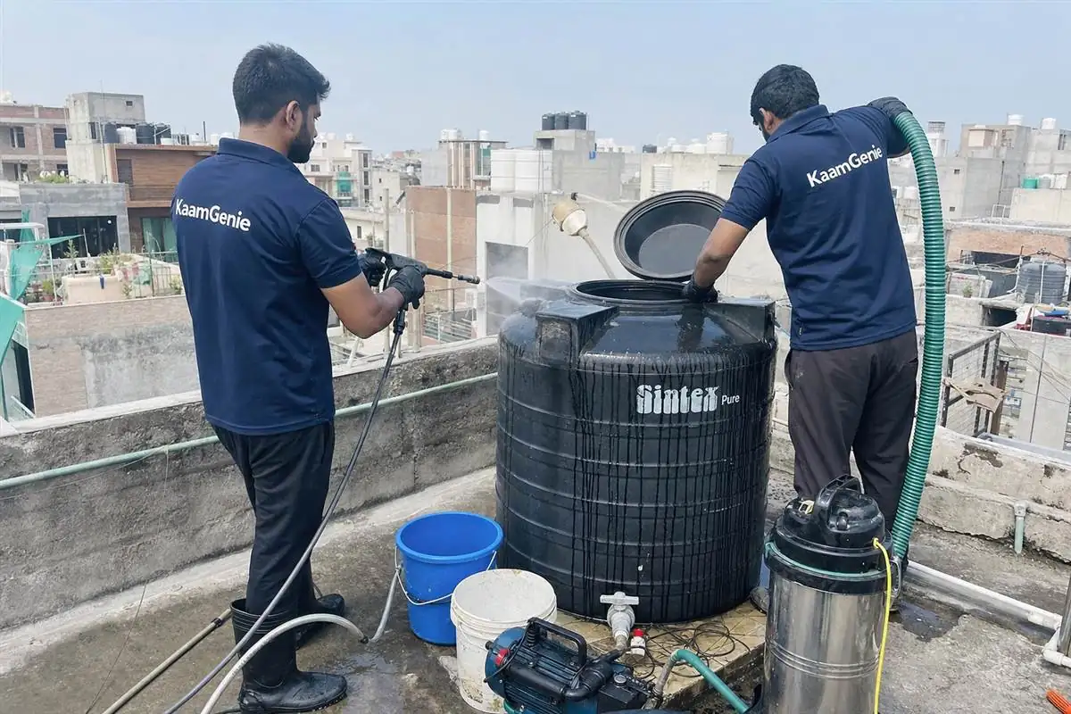 KaamGenie crew cleaning a water tank in Rohini Sector 5, Delhi